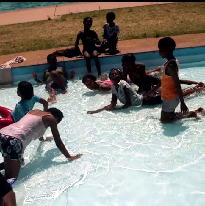 Children taking part in a supervised swimming outing