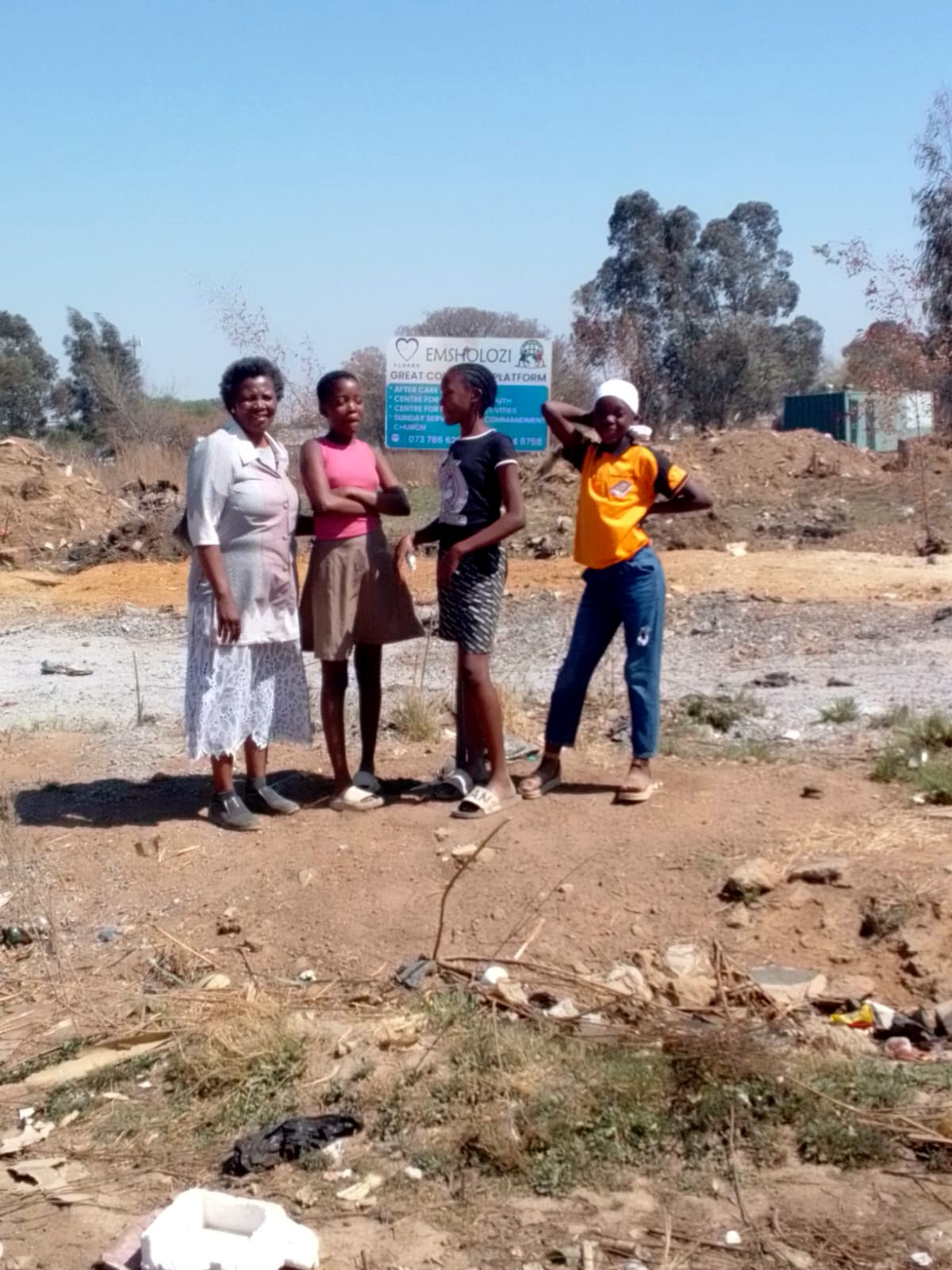Bongi Jele and young people at the former Emsholozi project site